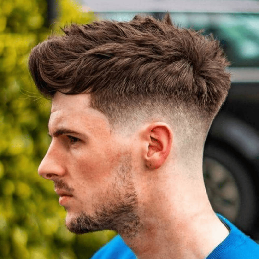 skin fade with messy textured top