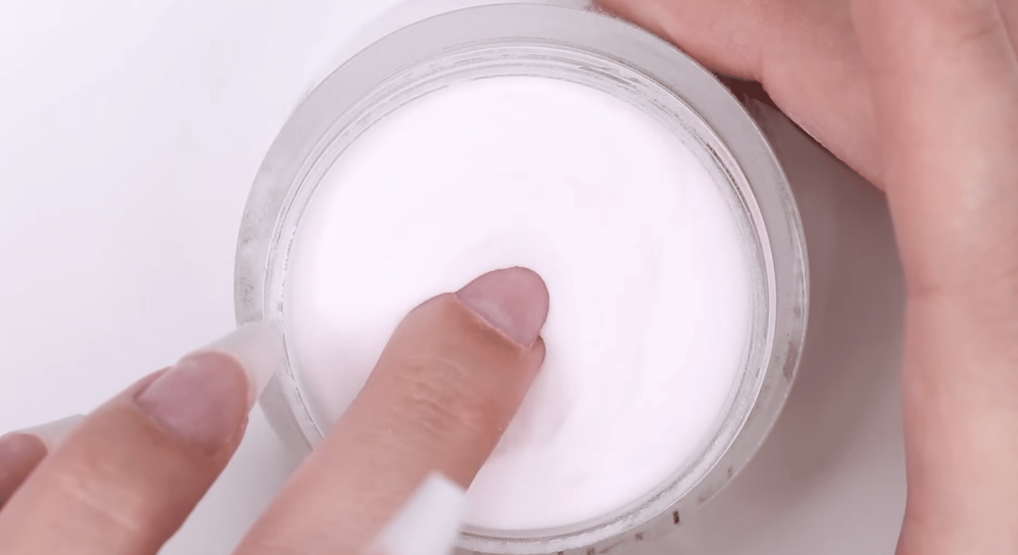 dipping or brushing on the powder