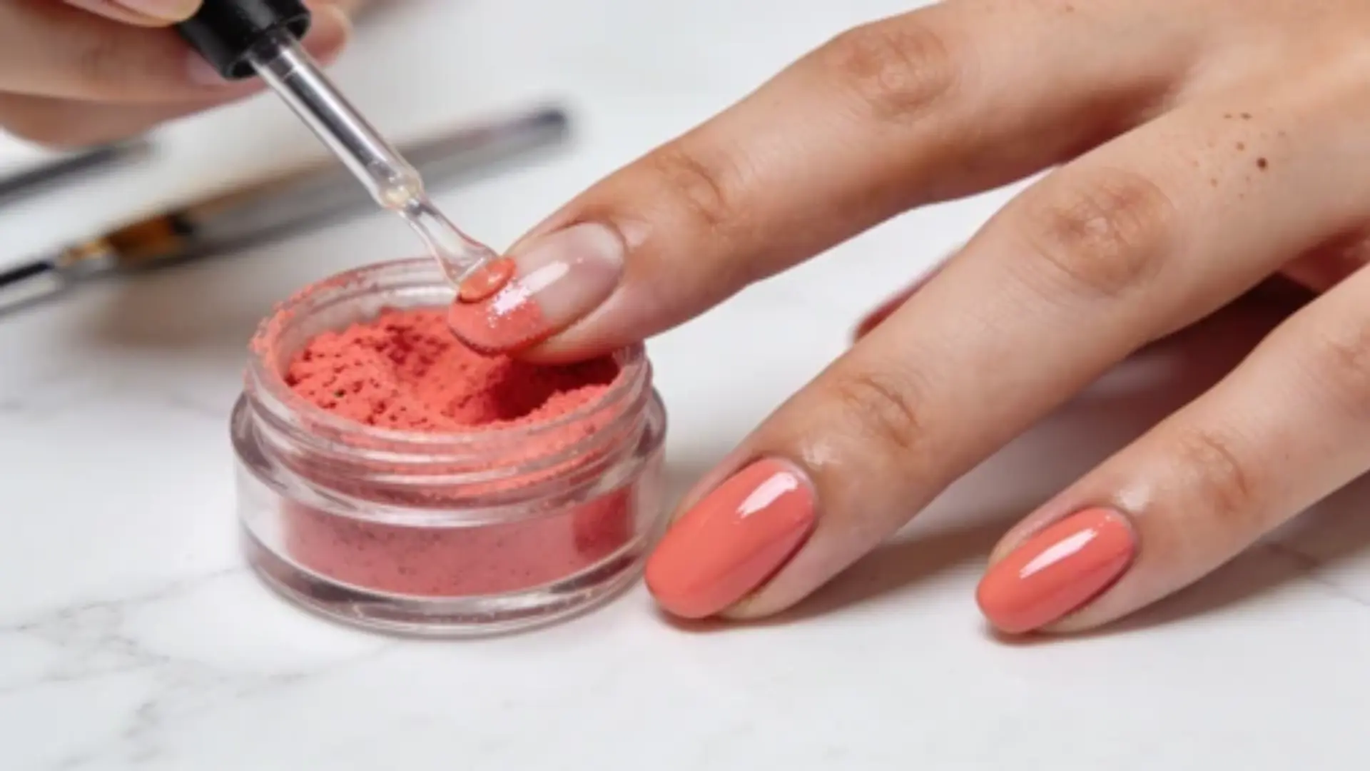 dip nails dipped in powder solution for manicure