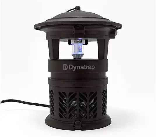 Outdoor insect trap with blue light on in black casing against white background