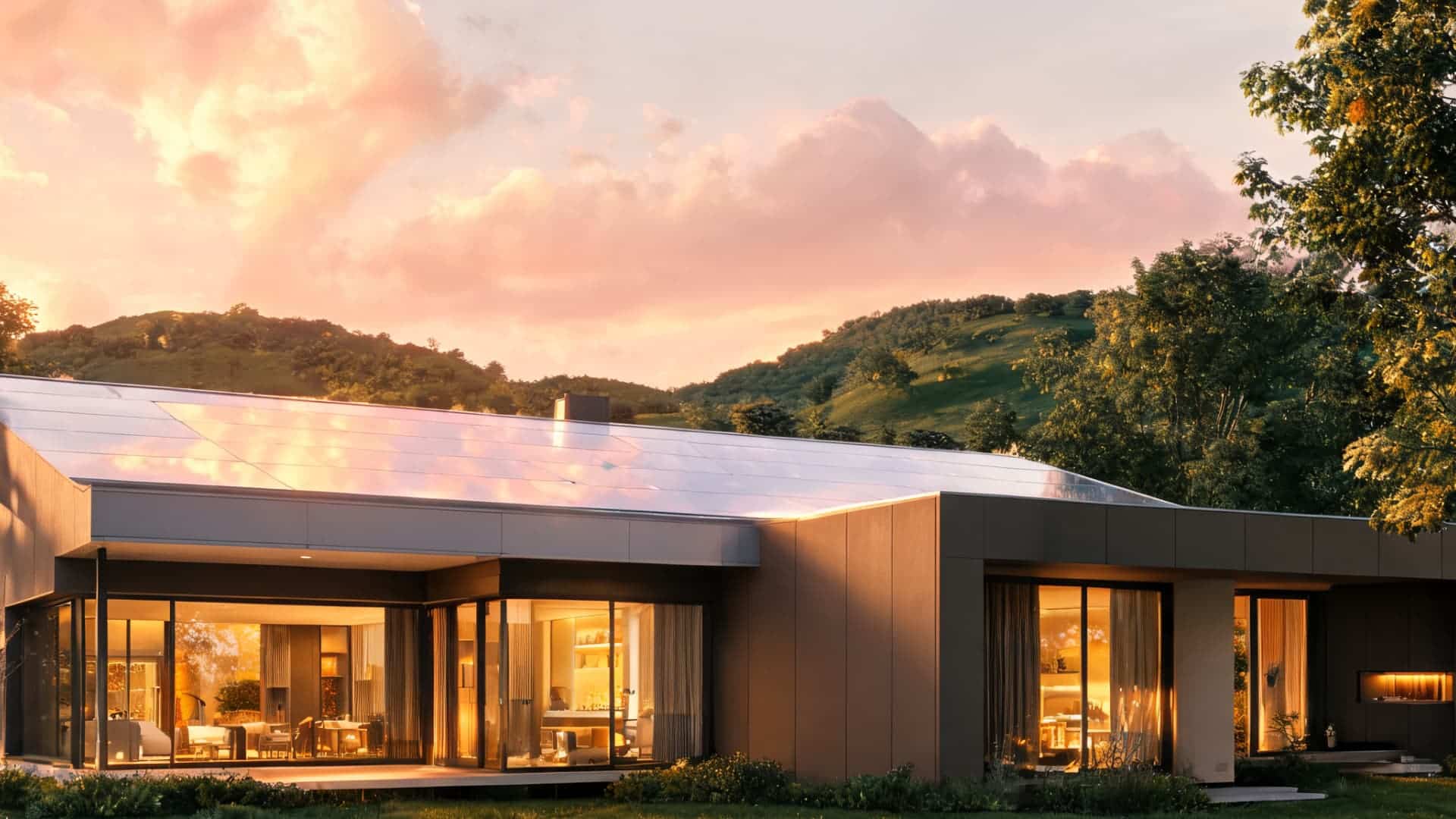 modern eco house with cool metal roof and glass walls in warm sunset light surrounded lush green landscape