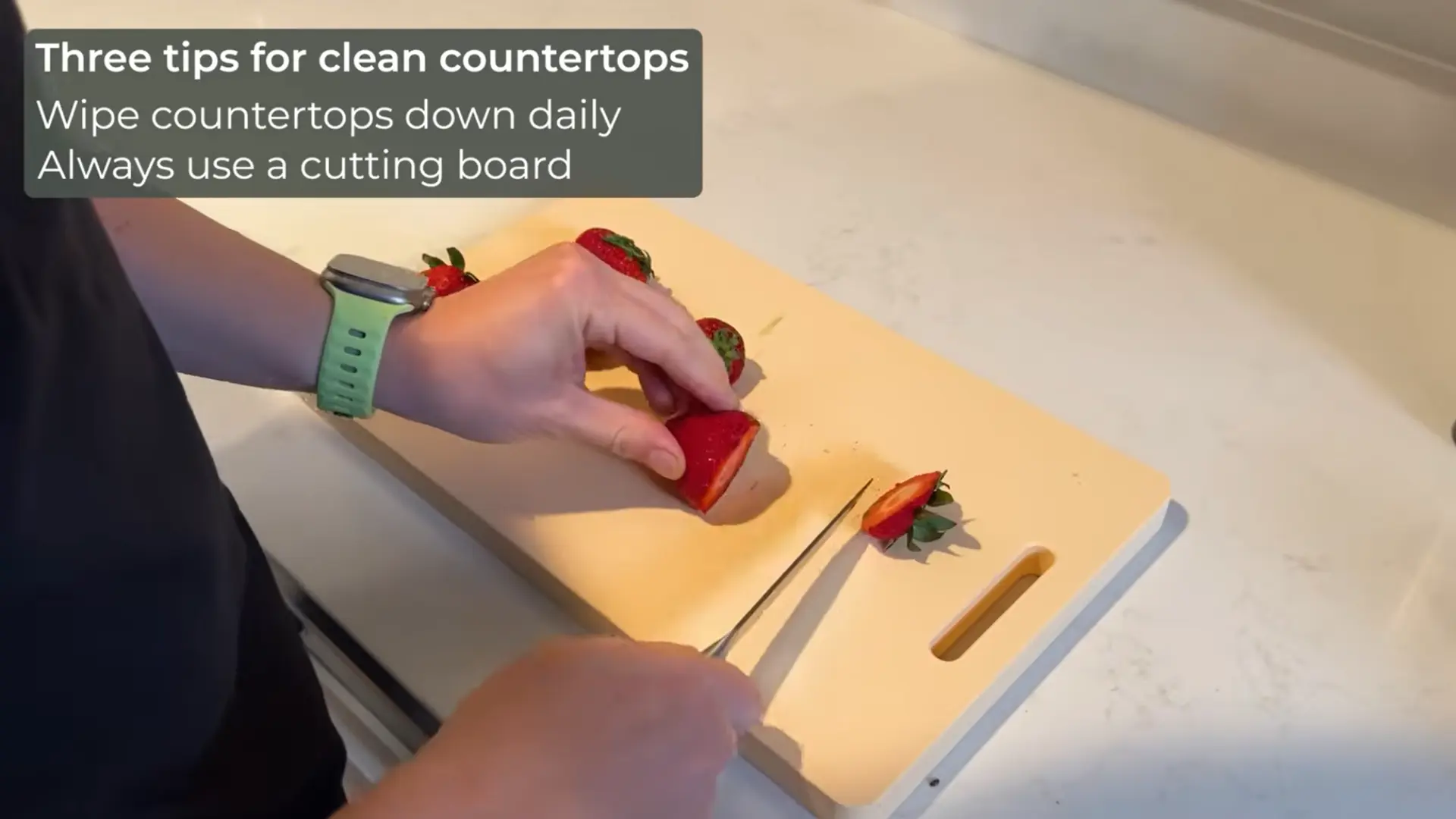 protecting quartz countertop with cutting board and hot pad to prevent scratches and heat damage