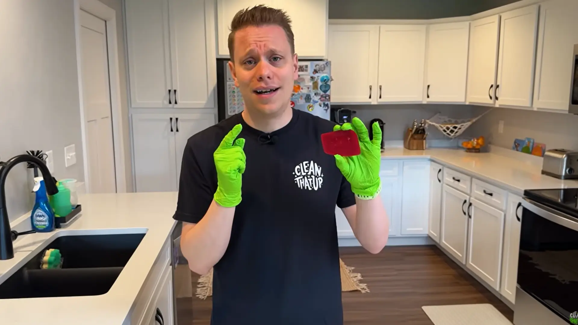 removing stuck food from quartz countertop using plastic scraper without scratching surface