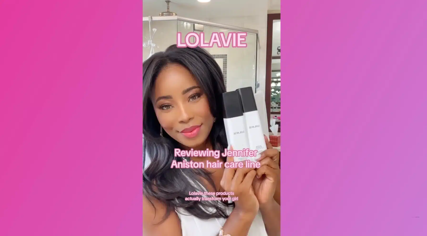Person holding LolaVie hair care products while reviewing Jennifer Aniston’s hair care line.