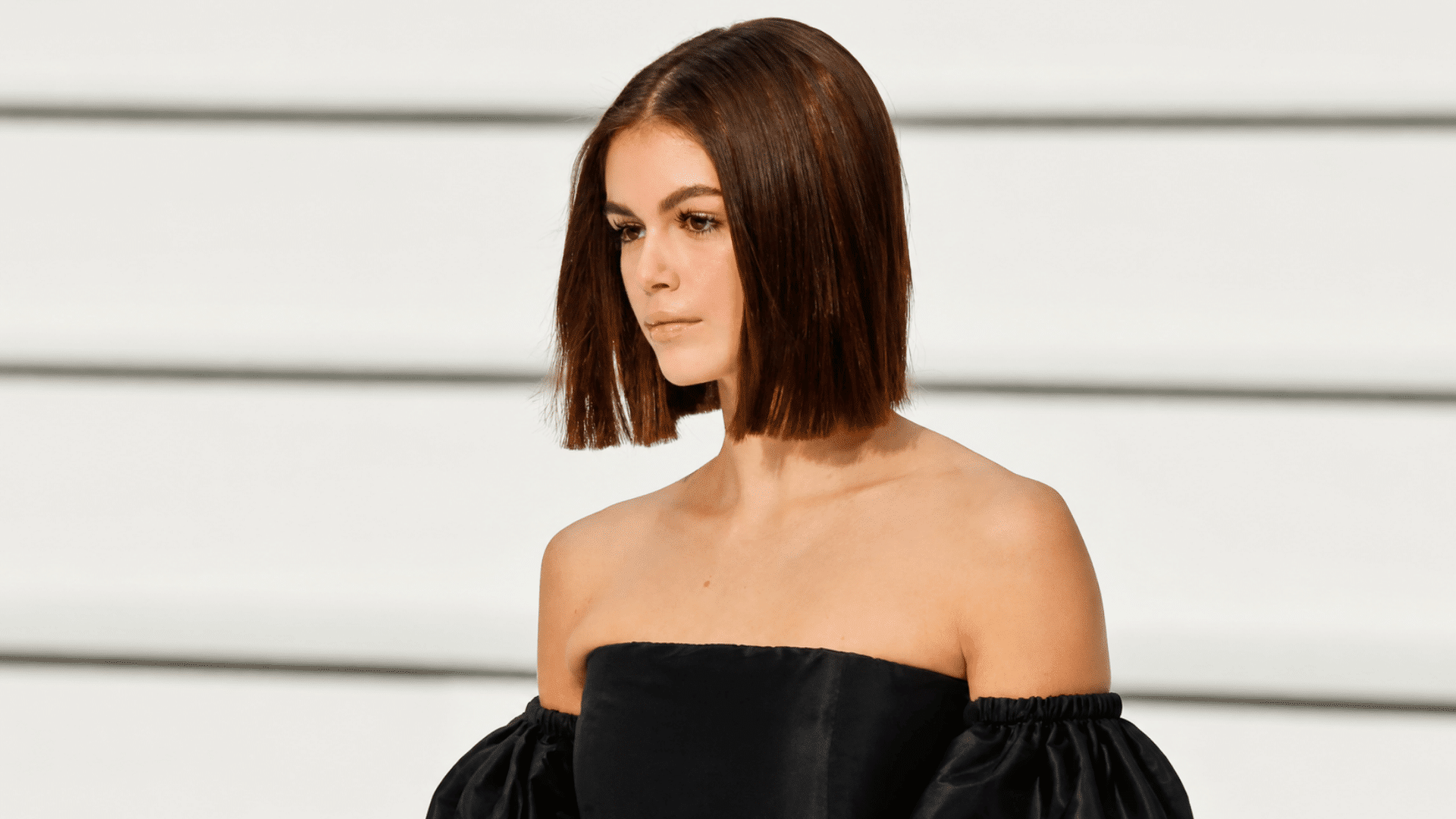 a layered bob for straight hair with sleek strands and subtle shaping creates a polished look with clean lines and soft movement