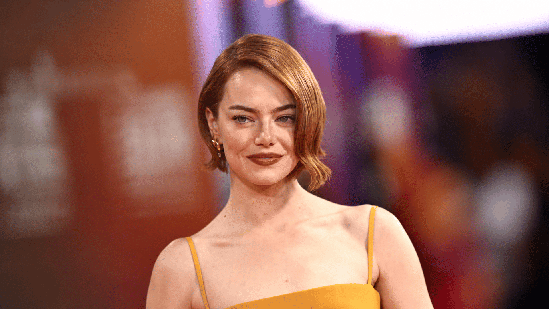 a side parted layered bob with smooth waves and tucked ends creates a polished shape with soft texture and movement