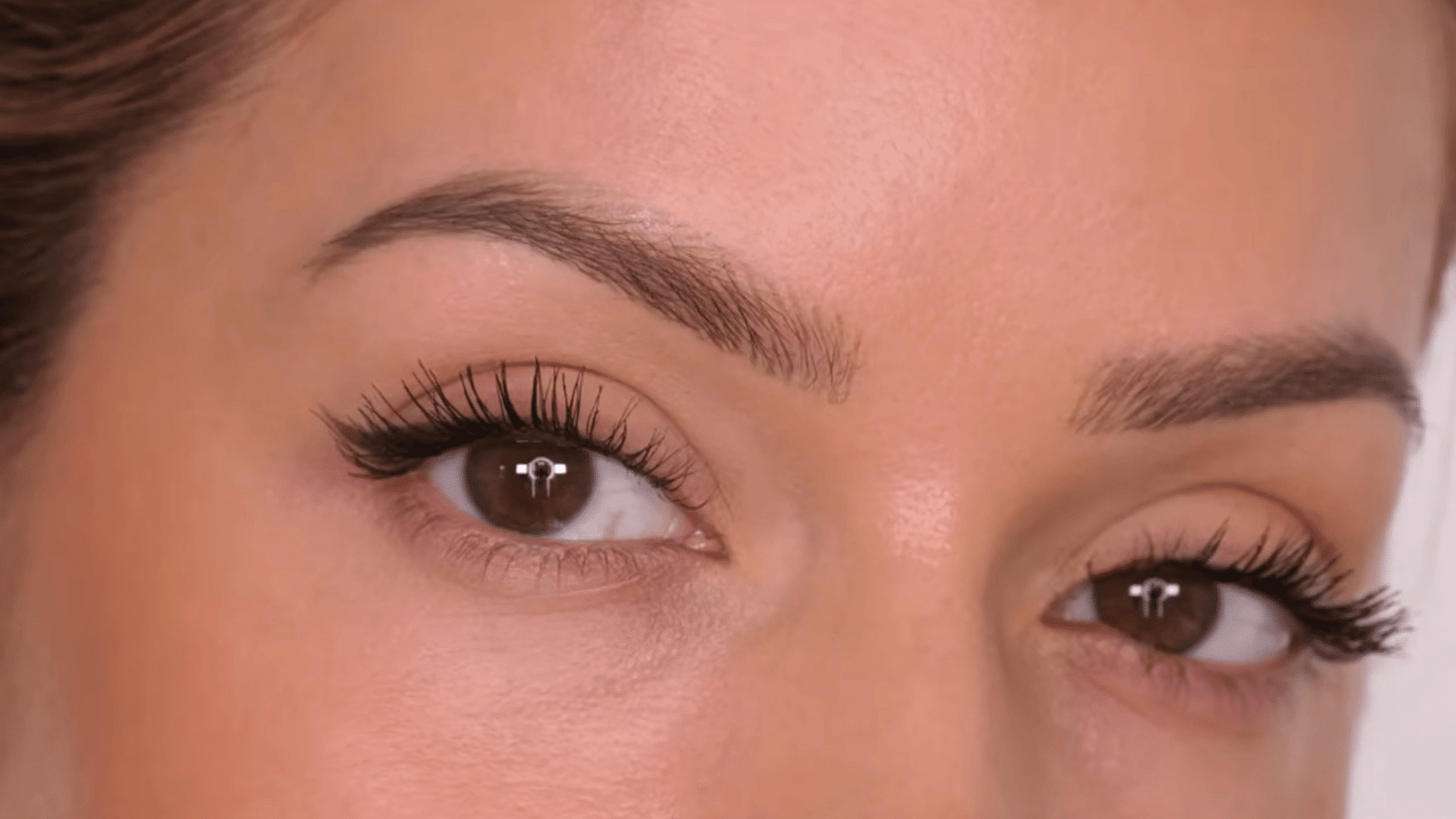 adjust the second eye for symmetry by matching the eyeliner shape and wing angle for an even eye look