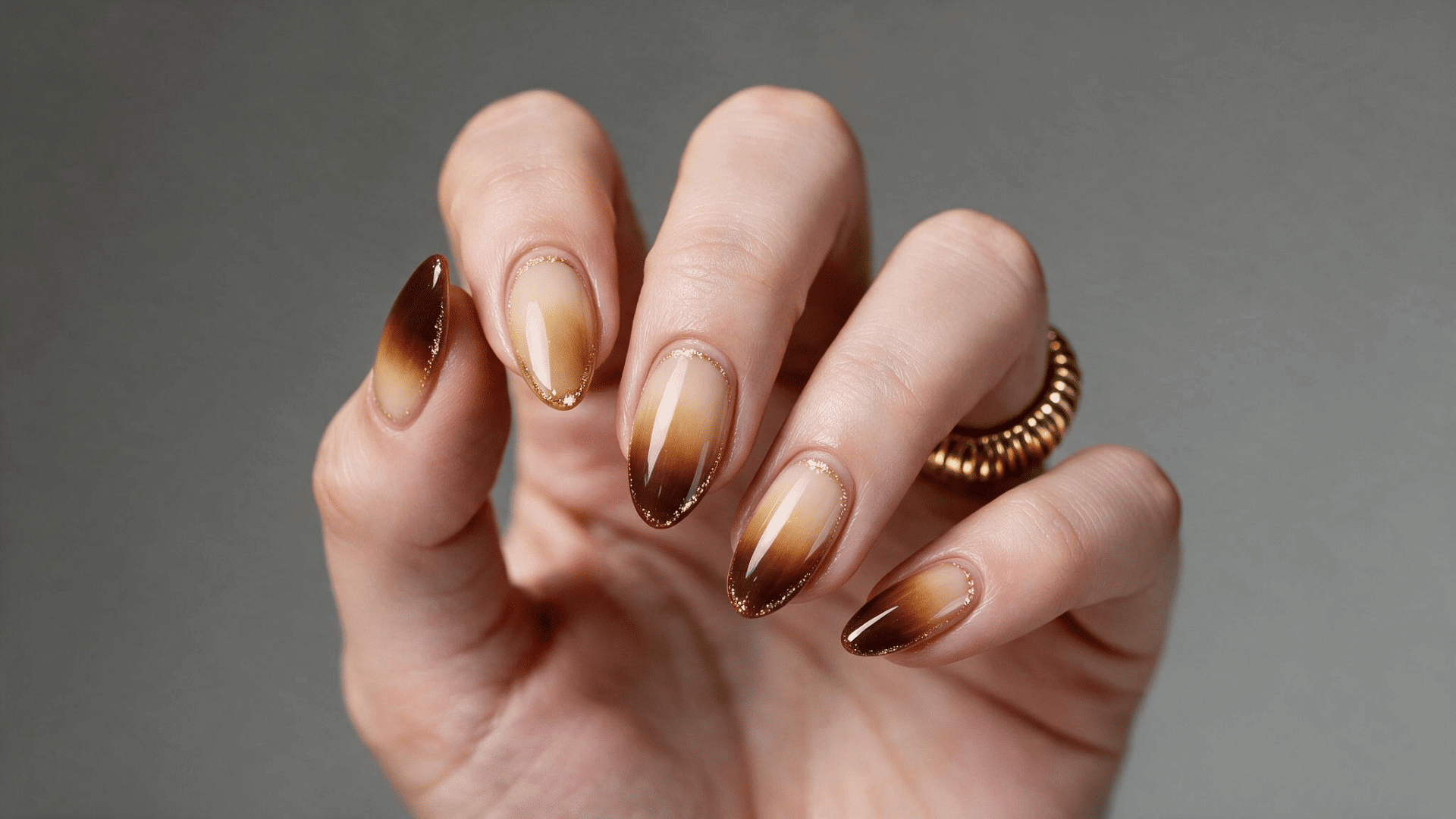 caramel latte ombre nails with creamy nude bases fading into caramel and dark coffee brown tips