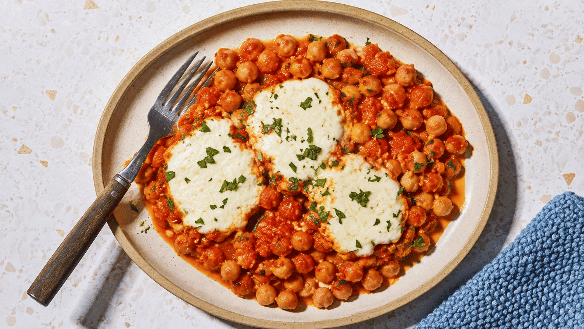 chickpea marinara with melted mozzarella and fresh parsley