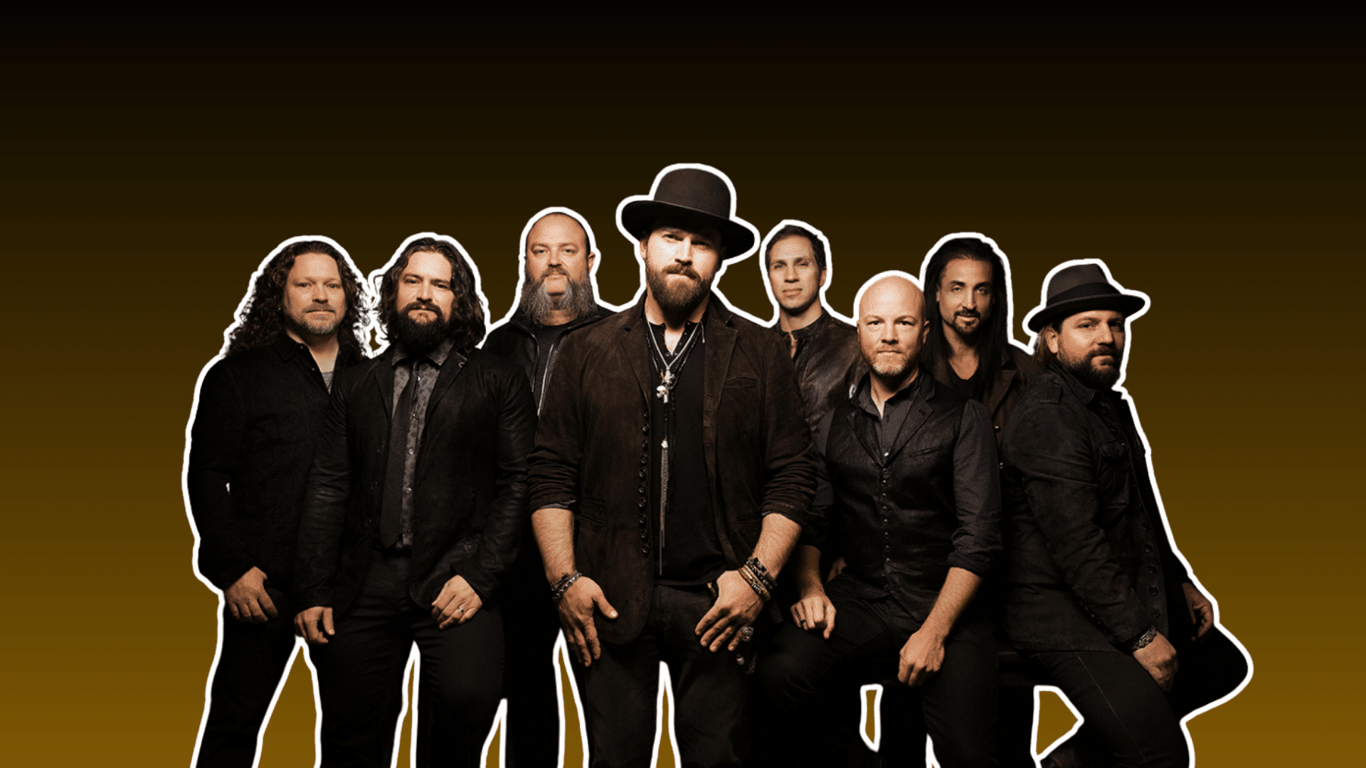 country music band posing together in dark outfits against a brown background with several members wearing hats