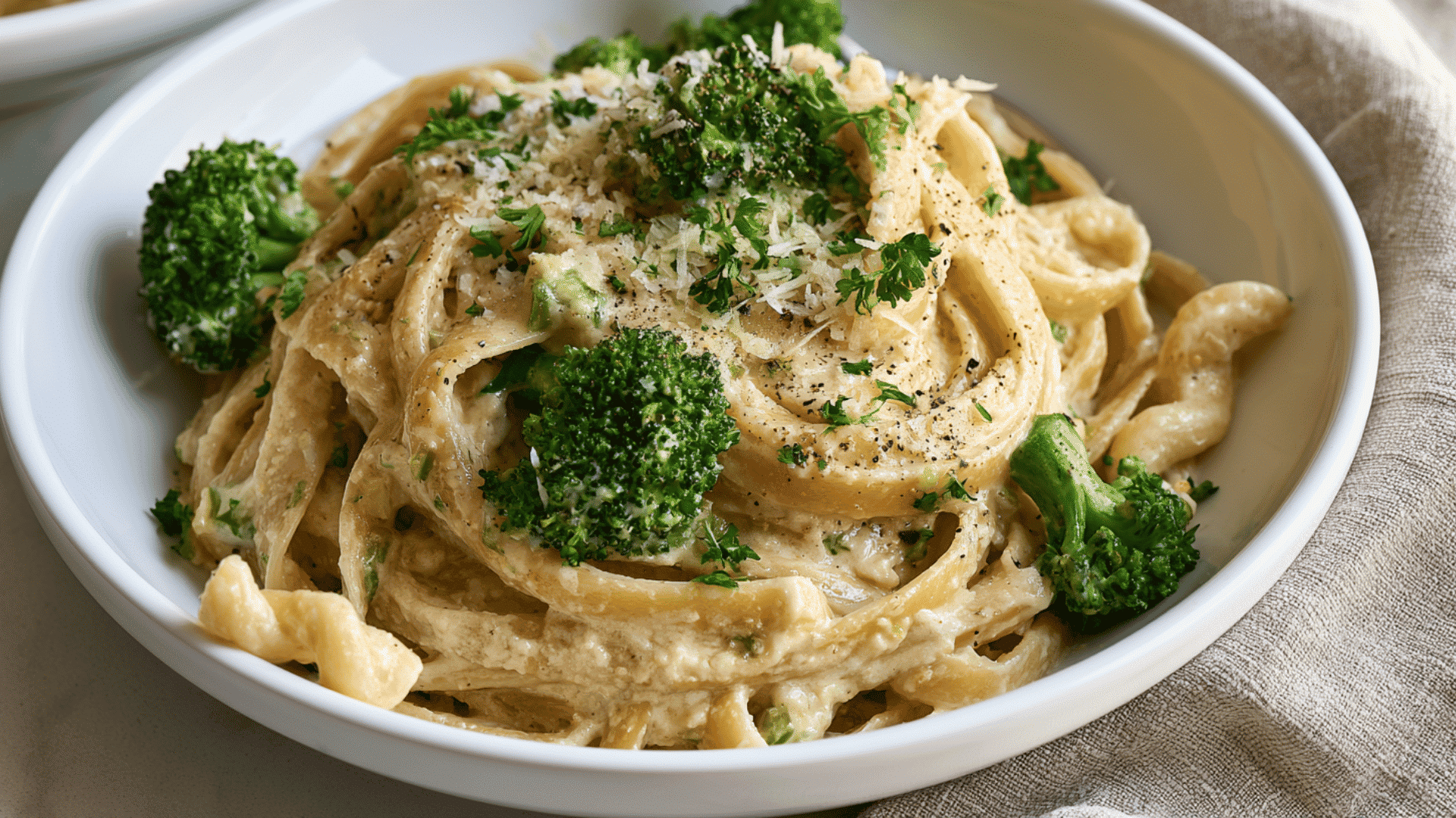 creamy cottage cheese alfredo pasta with broccoli parmesan black pepper and fresh parsley