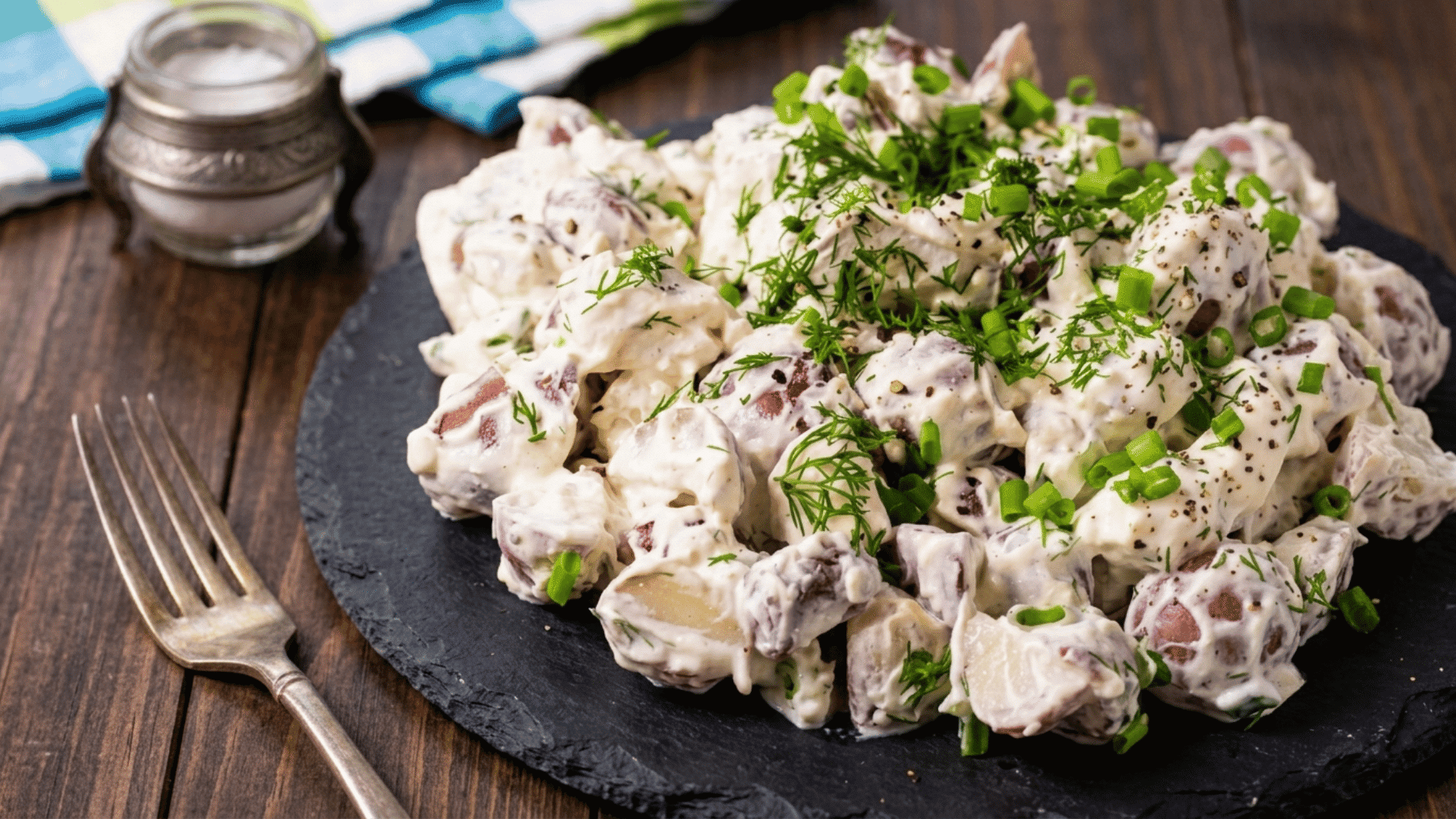 creamy dill boiled potatoes coated with sour cream fresh dill lemon juice and light seasoning