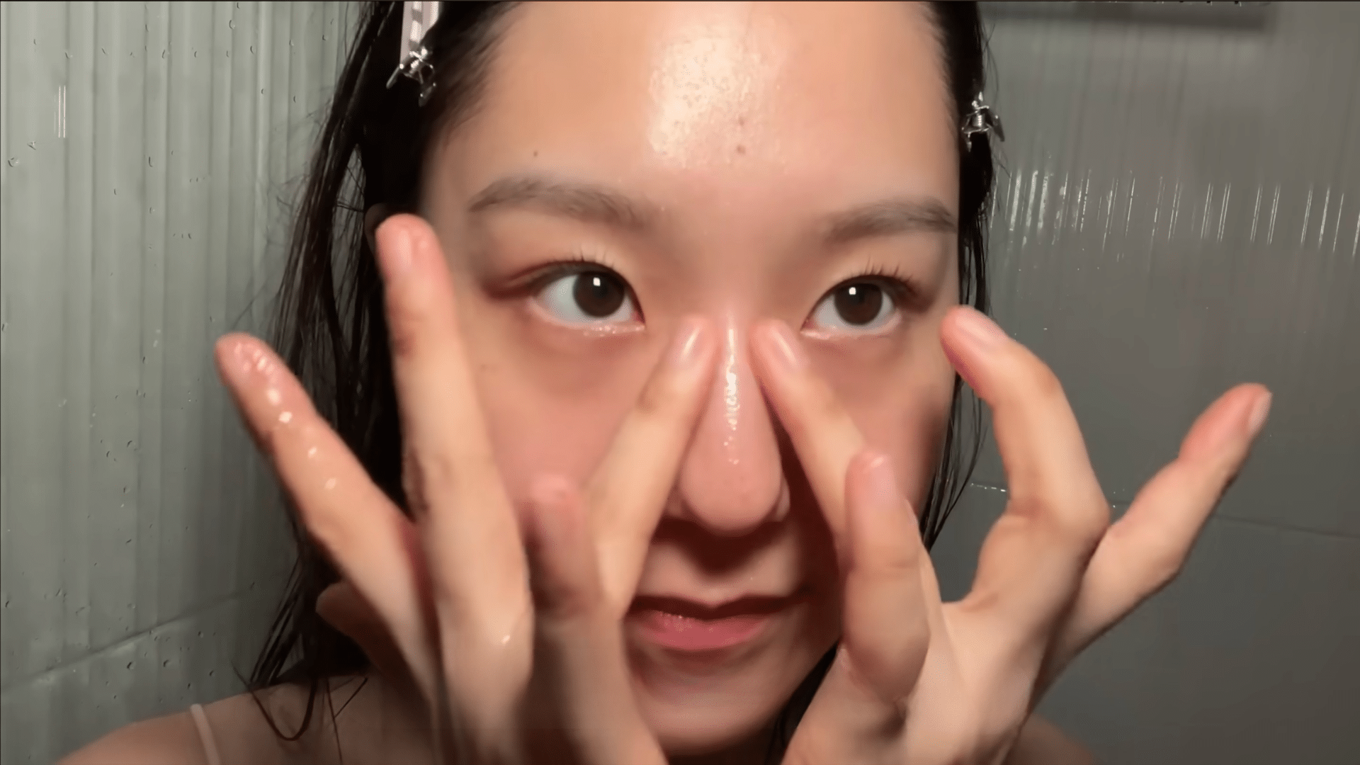 emulsifying cleansing oil with lukewarm water before rinsing the nose to remove loosened oil and residue