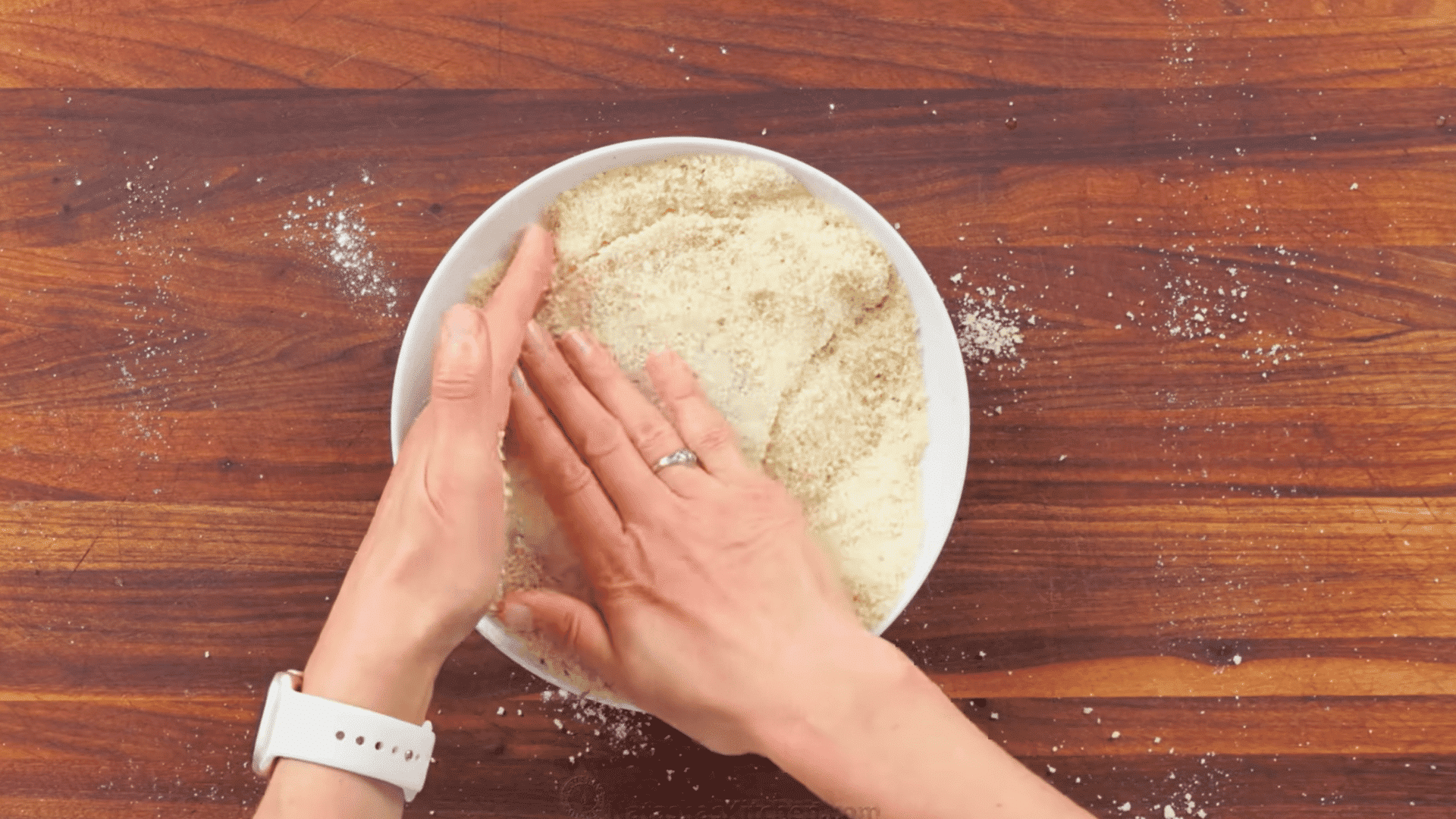 flour, egg wash, and seasoned panko breadcrumbs arranged for breading chicken cutlets.