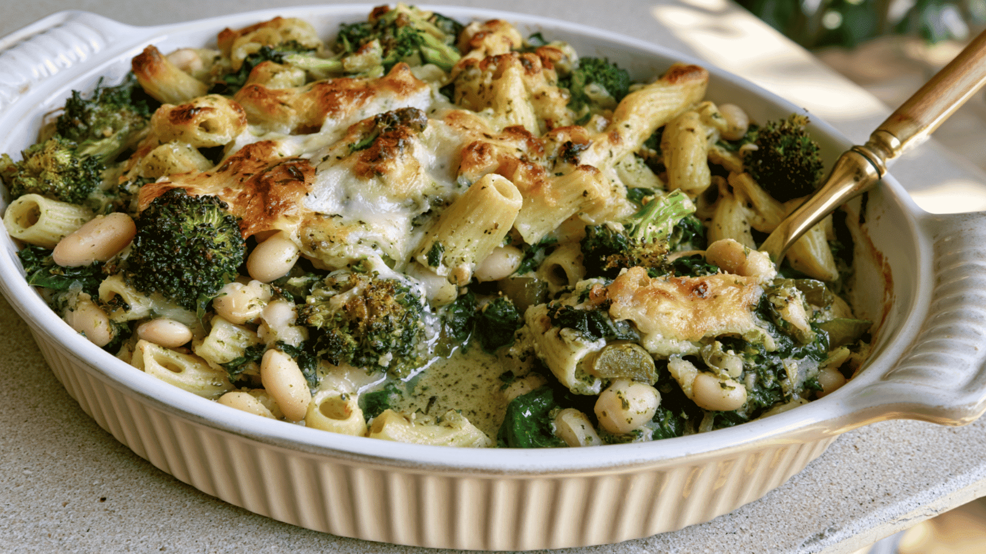 green goddess pasta bake with spinach broccoli white beans green chiles and melted cheese