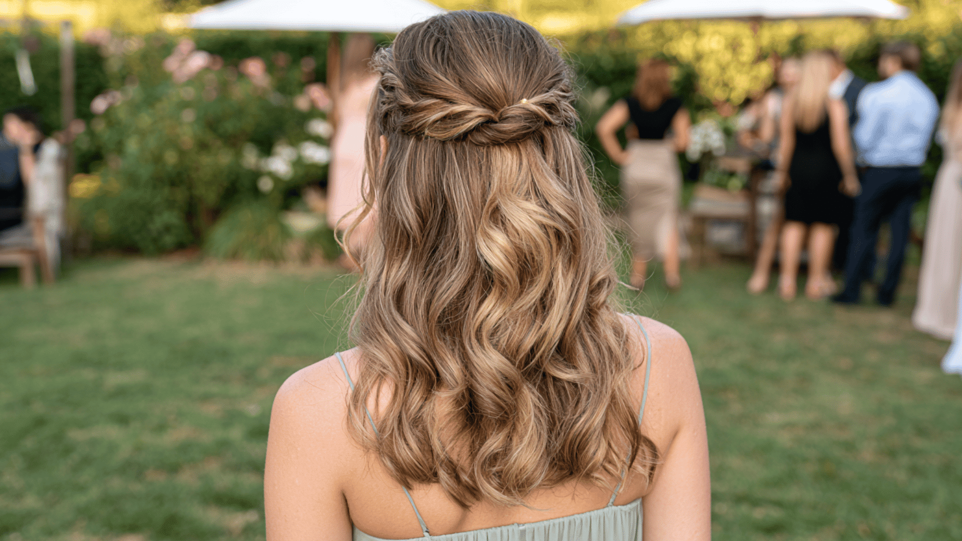 half up curls hairstyle with flowing waves for medium length bridesmaid hair