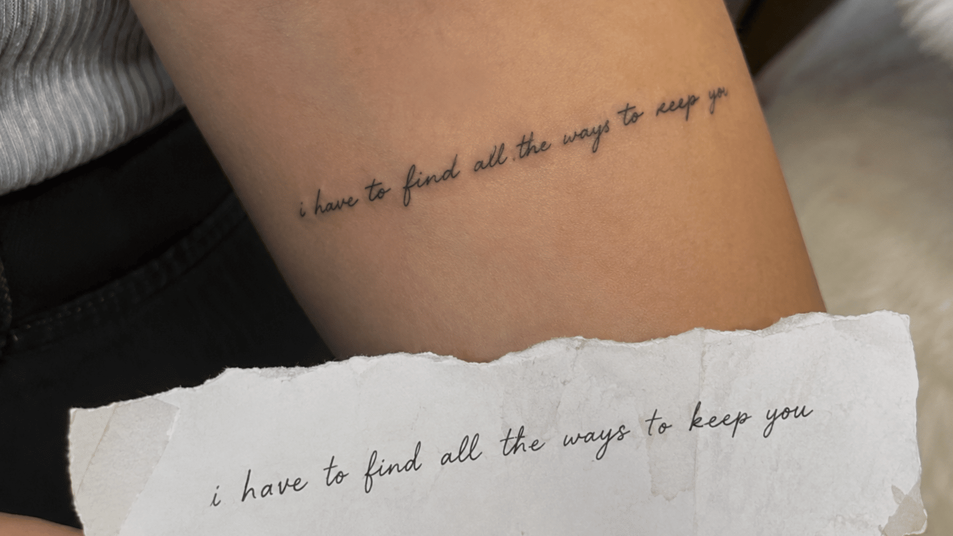 handwriting tattoo on the forearm beside a torn note with the matching cursive phrase, “i have to find all the ways to keep you.”