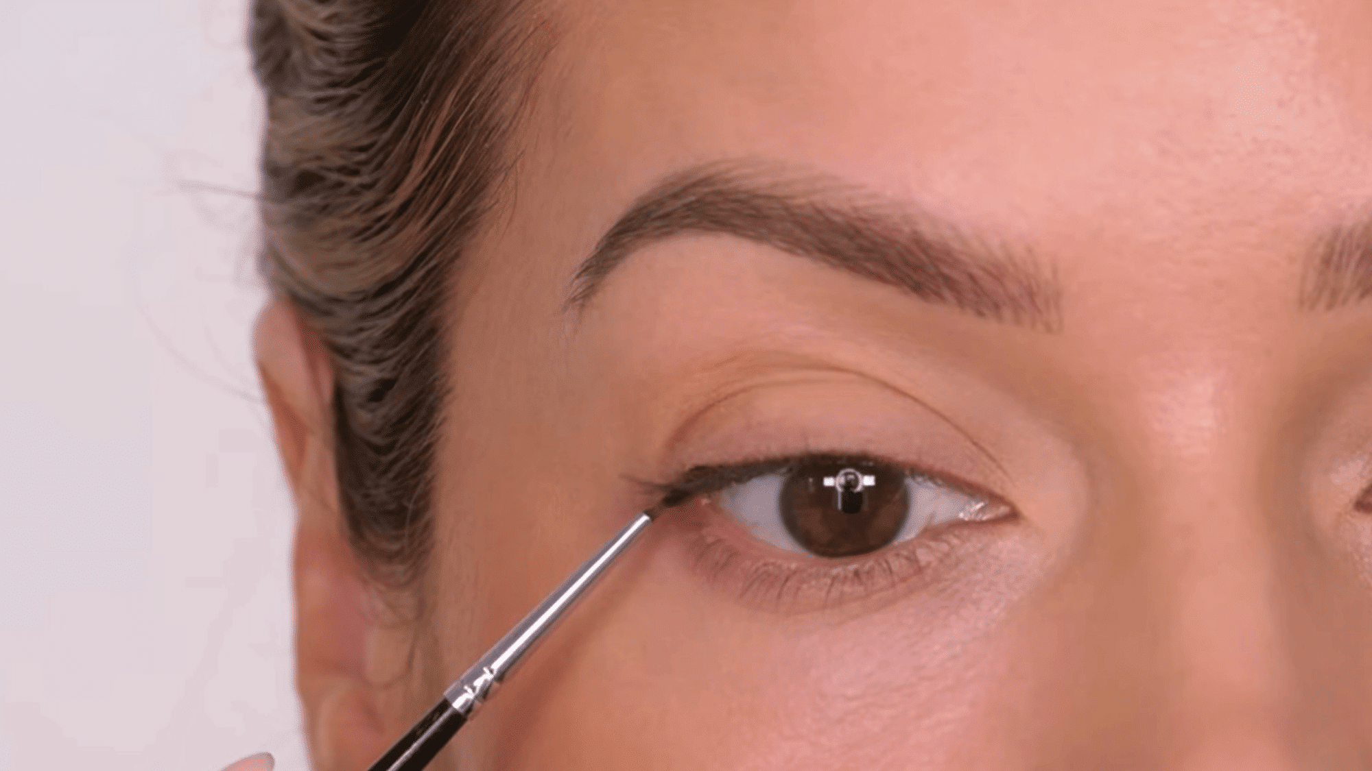 line under the upper lash line applied neatly for defined eyes and a fuller looking lash appearance