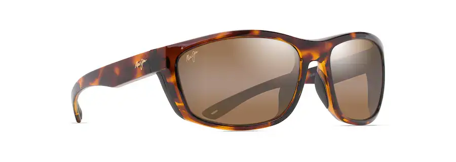 Tortoiseshell sunglasses with brown lenses on a white background