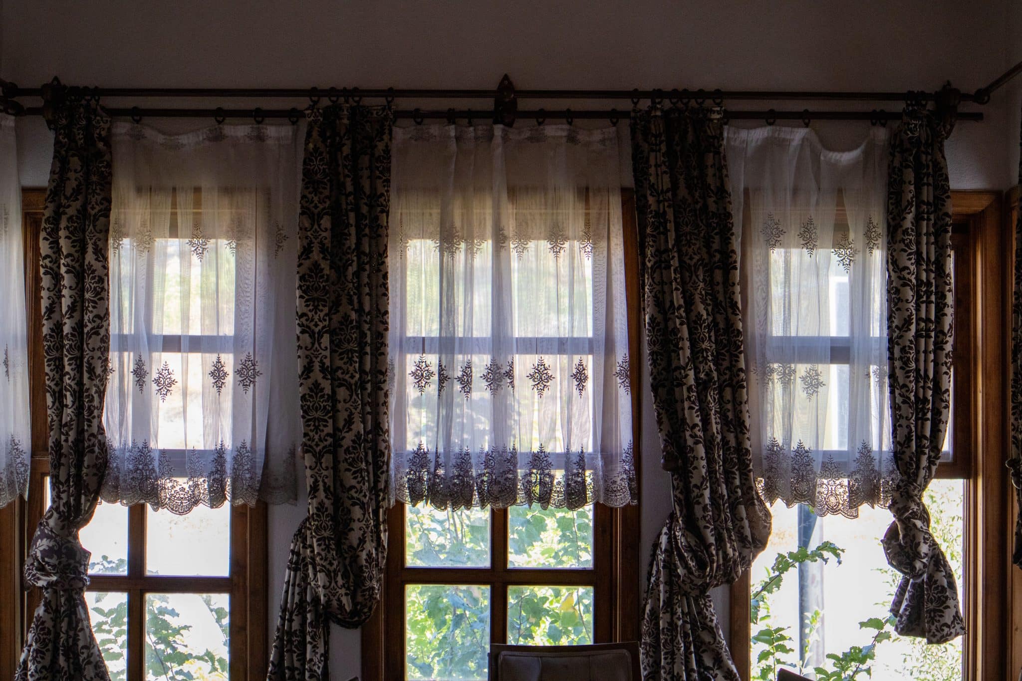 2. Use Curtains and Window Treatments to Hold In Warmth