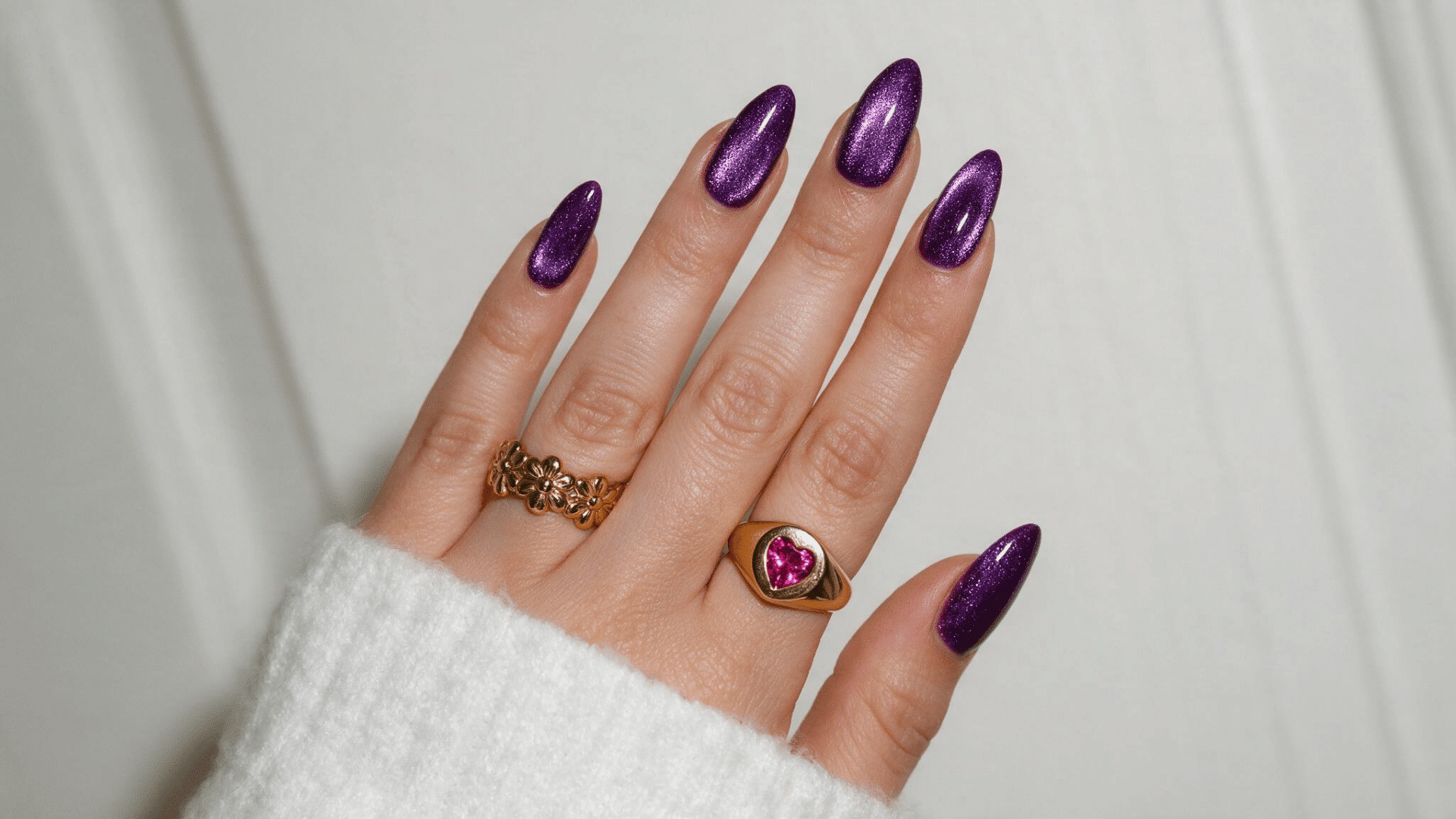 plum velvet ombre nails on almond shaped nails with a glossy deep purple magnetic shimmer finish