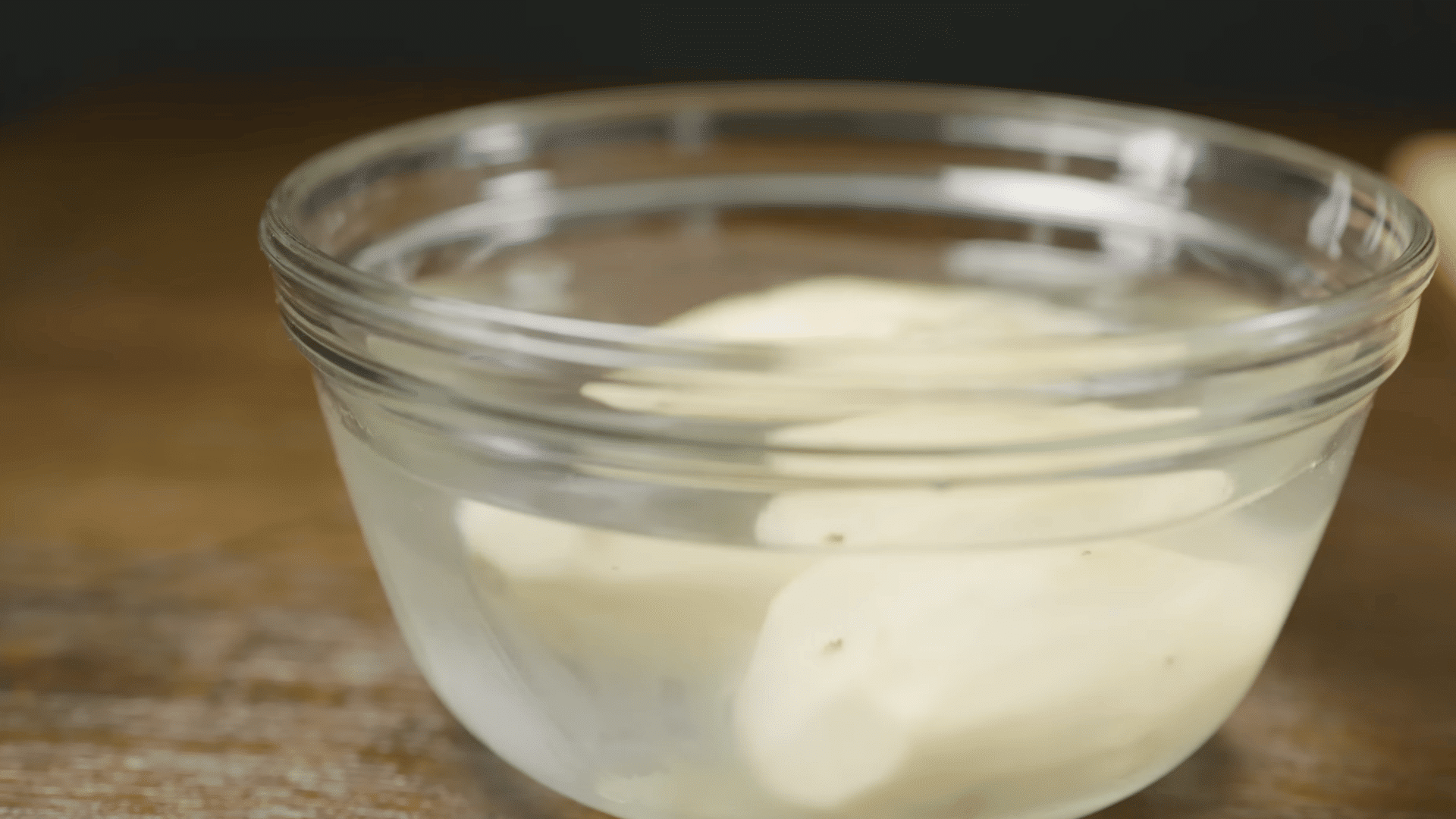 potato pieces fully covered with cold water in a deep cooking pot before heating