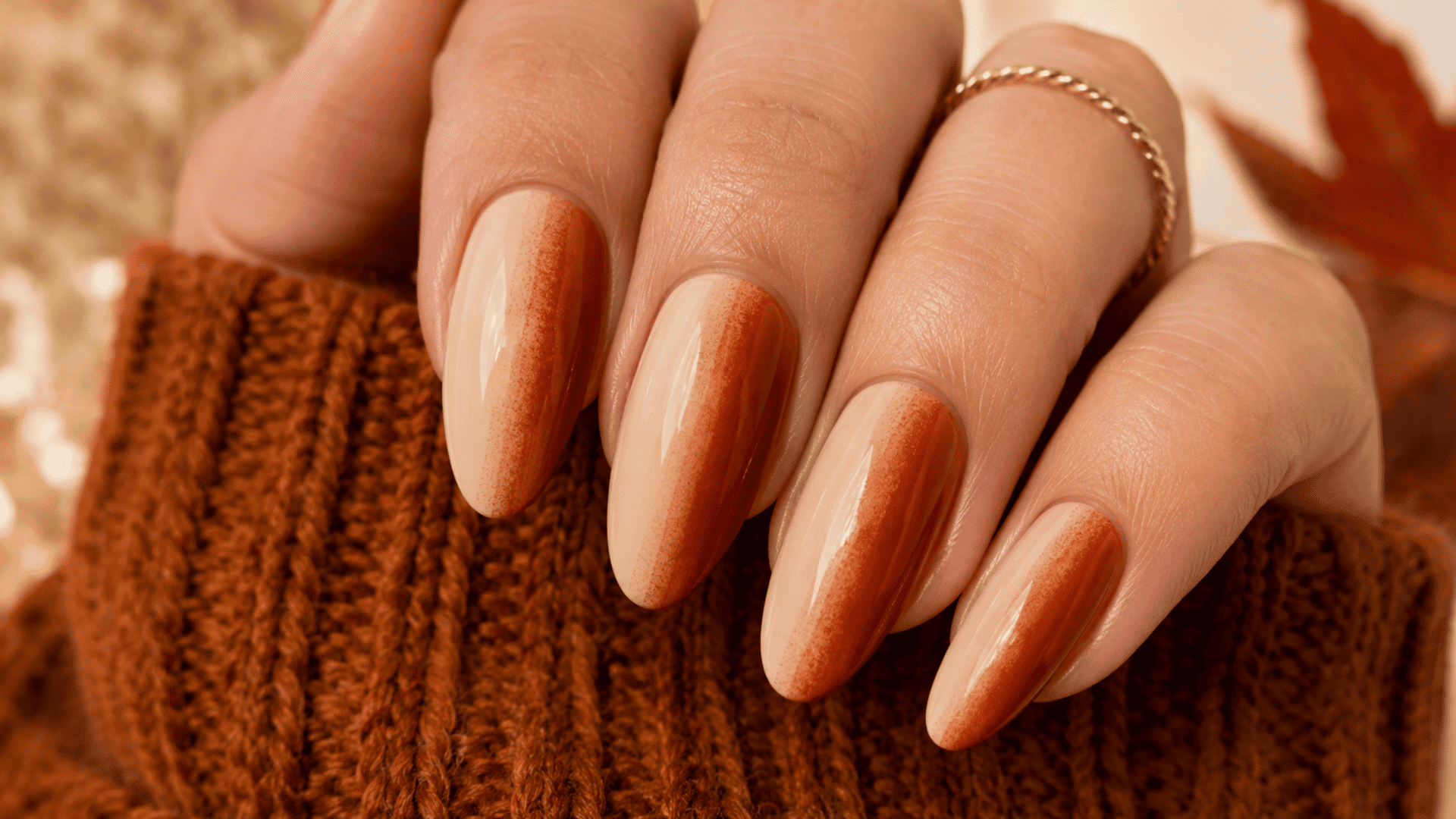 rust and cream vertical ombre nails with warm reddish brown fading into a soft nude cream base