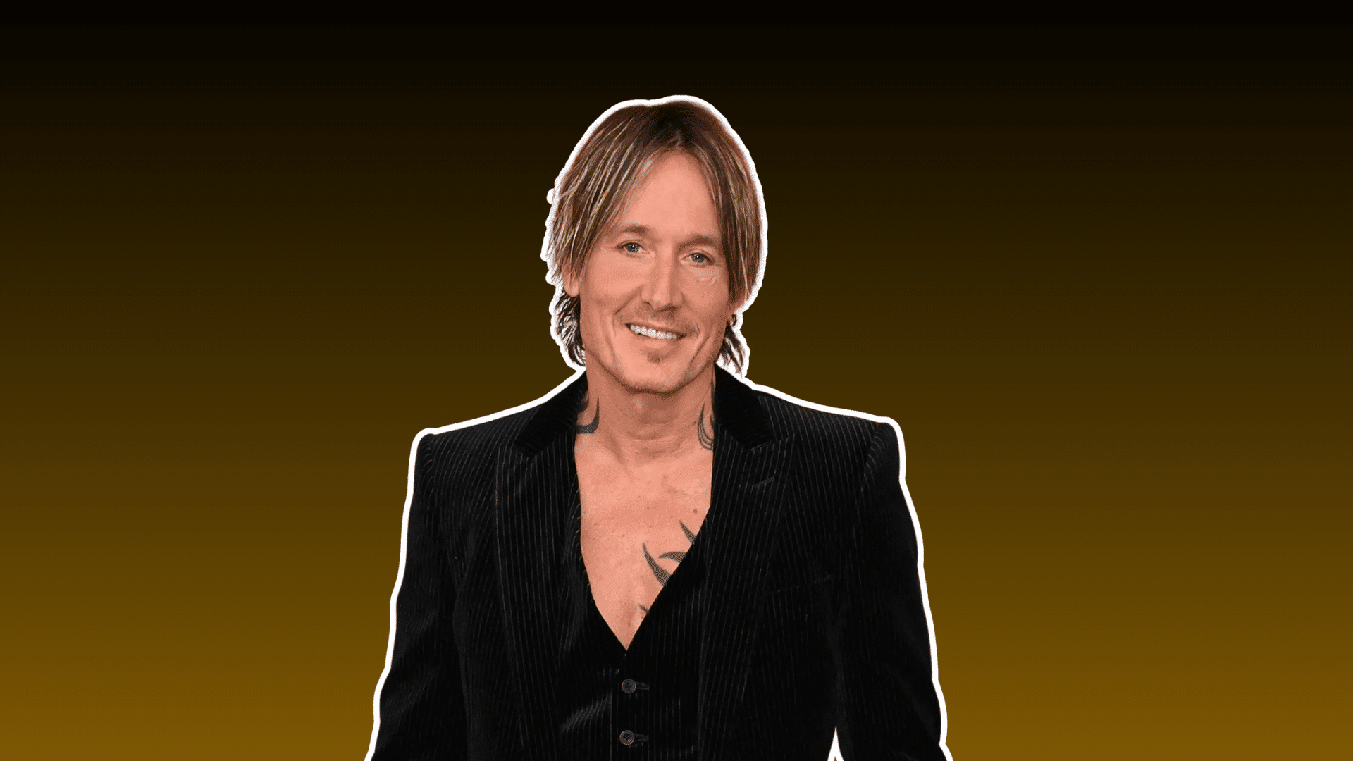 smiling male country musician with medium length hair wearing a black jacket against a dark brown background