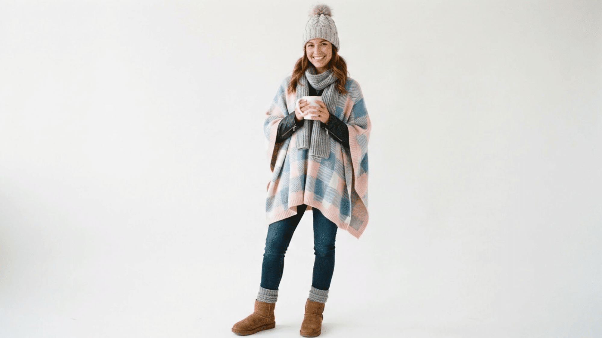 oversized scarf draped around the shoulders creating a cozy stylish layered look for cooler days