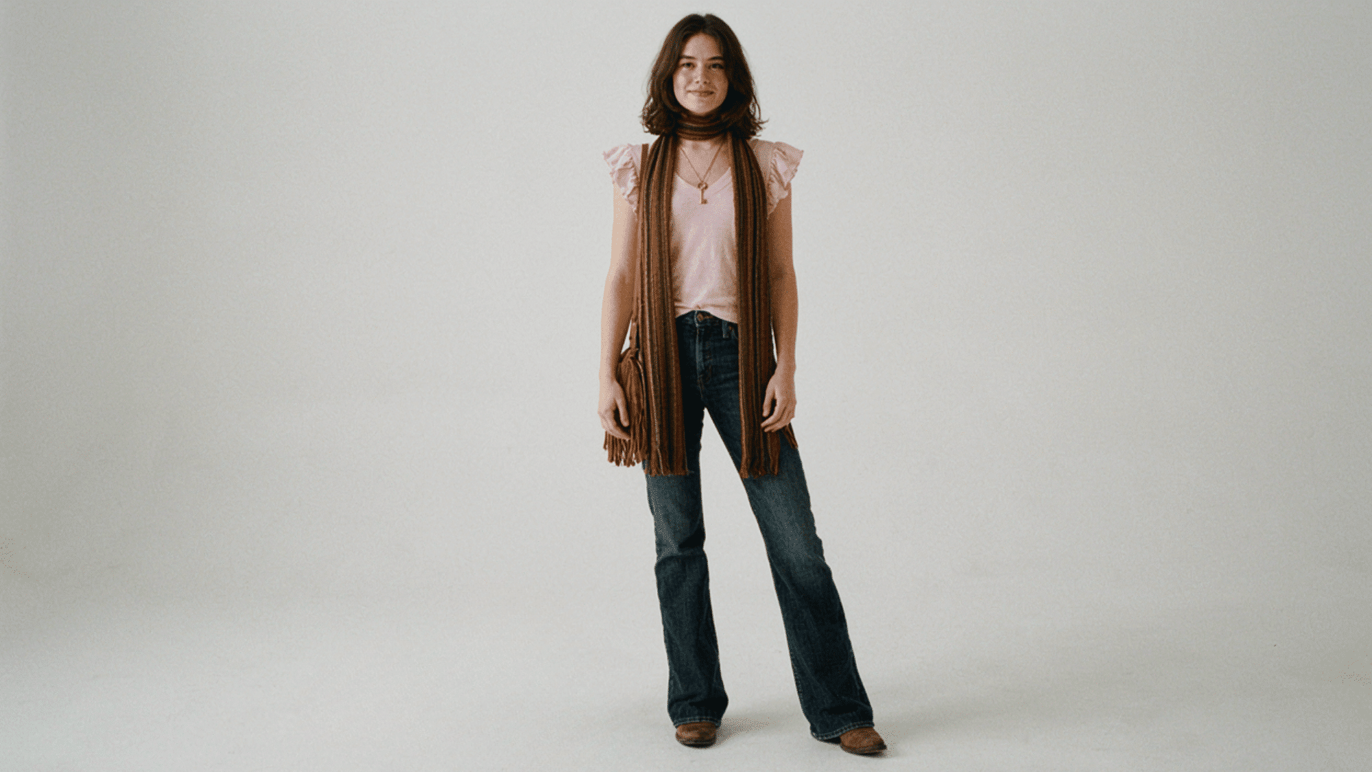 boho look scarf styled loosely with flowing fabric adding a relaxed and artistic touch to an outfit