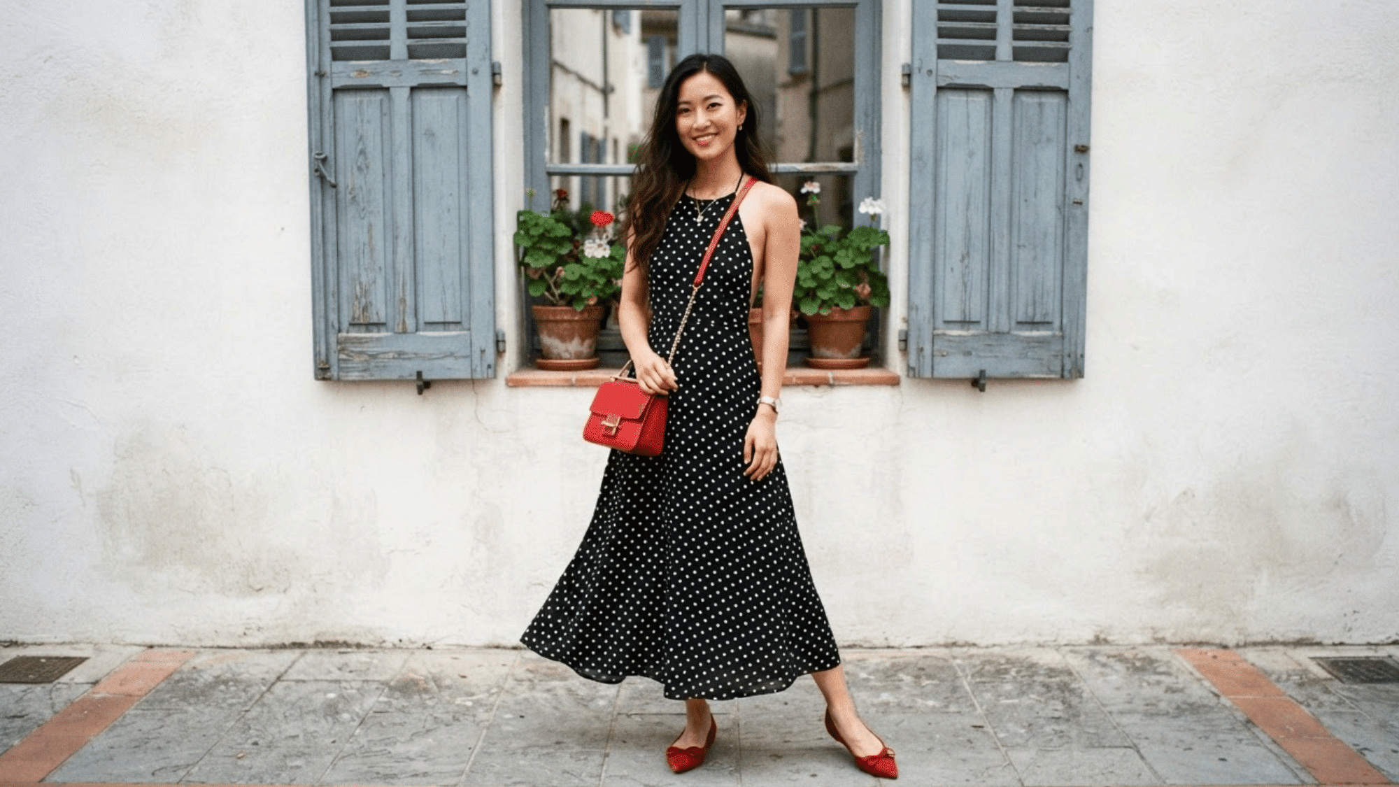 woman wearing an elegant halter dress with a neckline that ties behind the neck and a flattering fitted silhouette