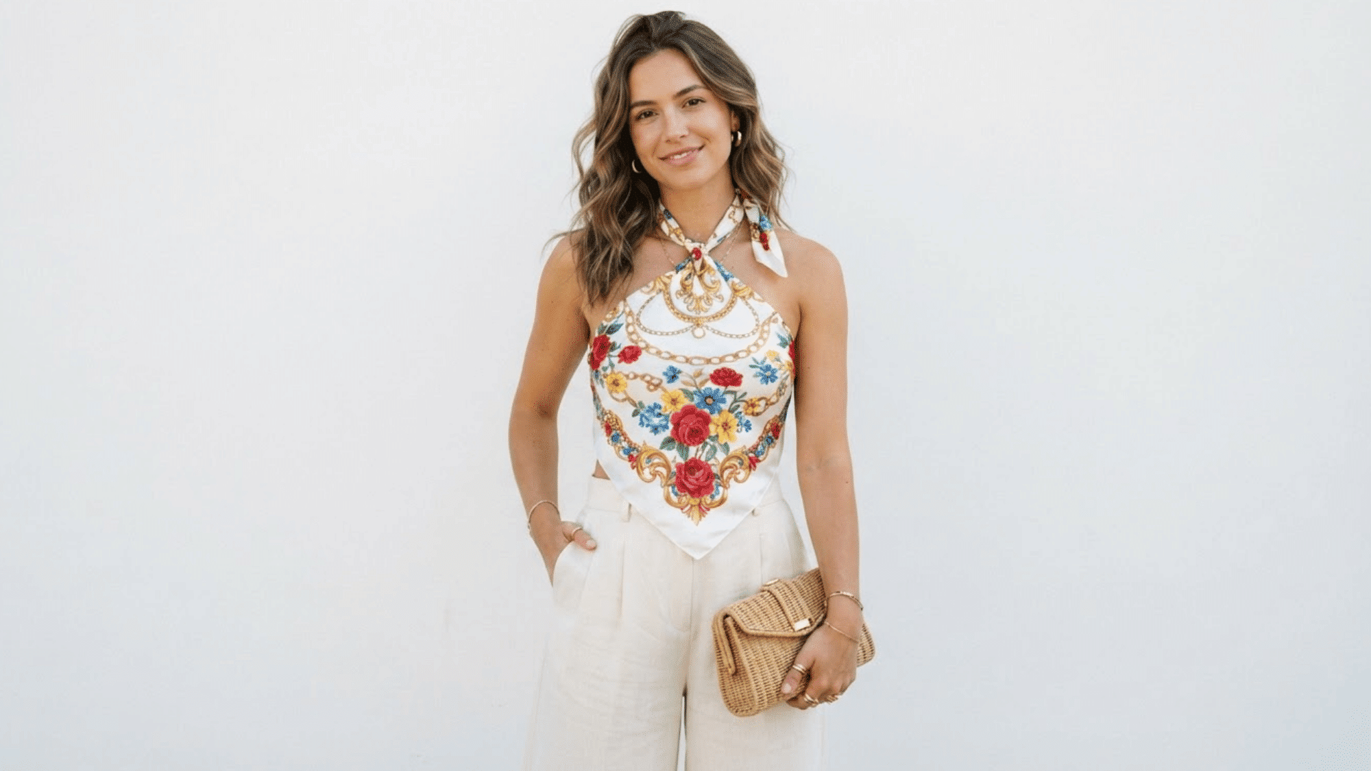 silk scarf styled as a halter top with a chic backless design creating an elegant summer look
