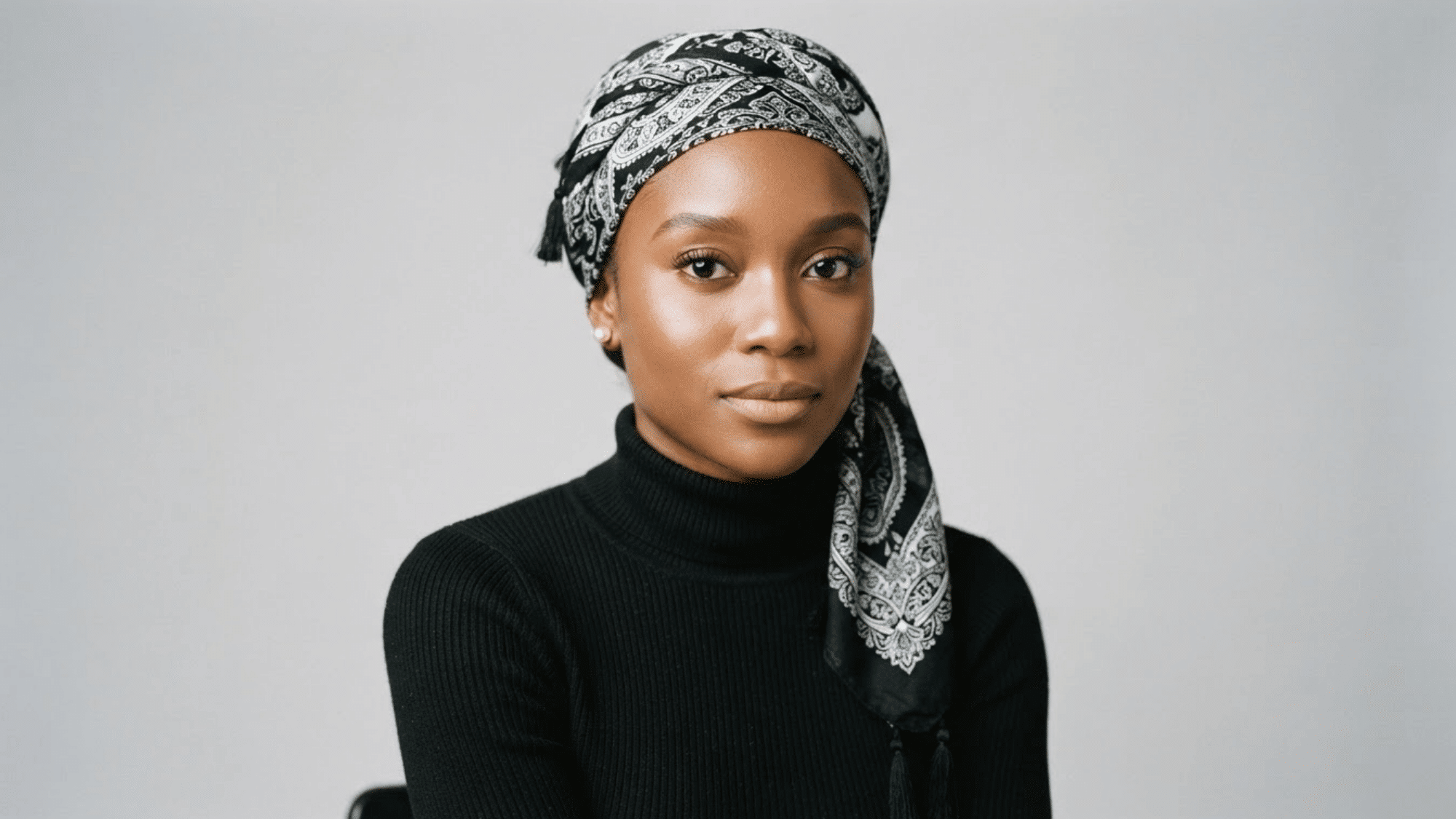 scarf worn as a head wrap covering the hair and adding a stylish bohemian touch to an outfit